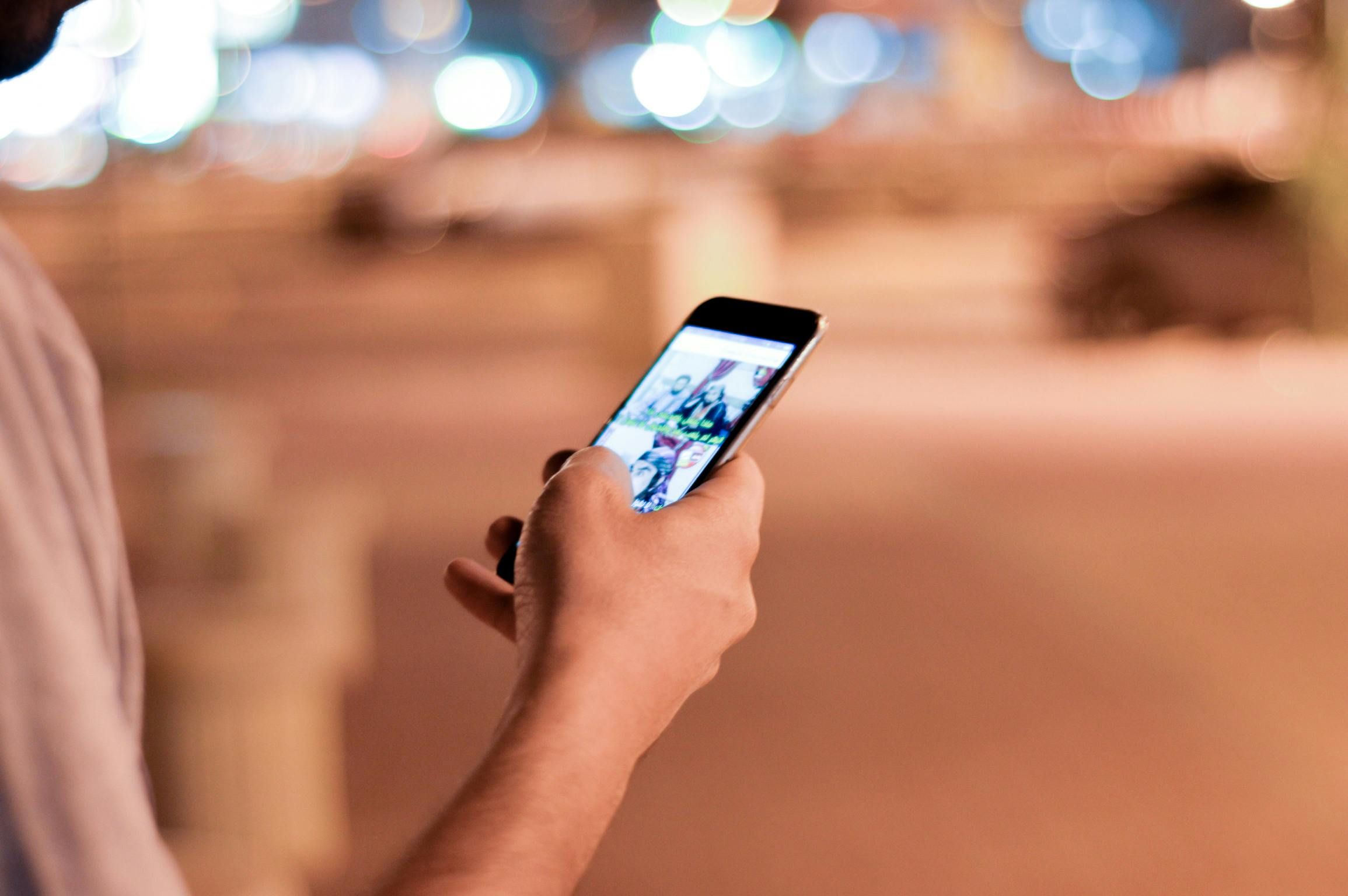Person scrolling through phone